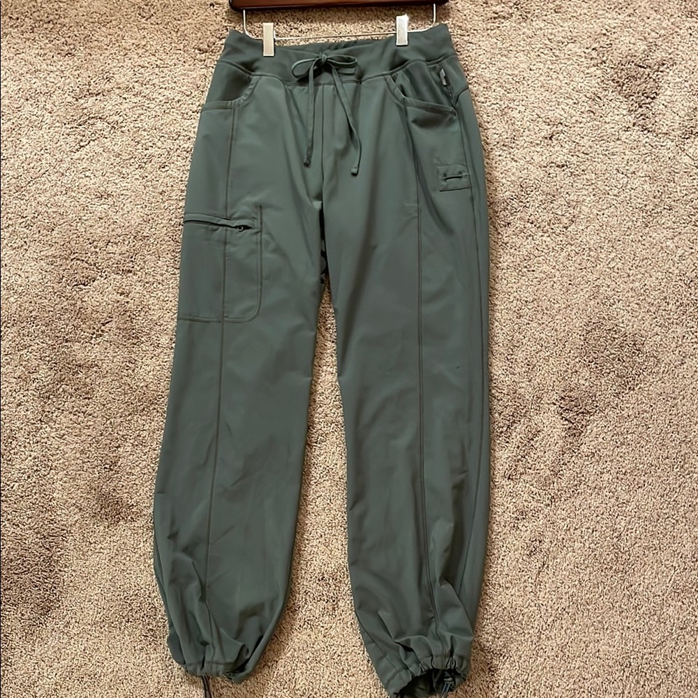 Women’s infinity, olive green scrub pants, size medium.